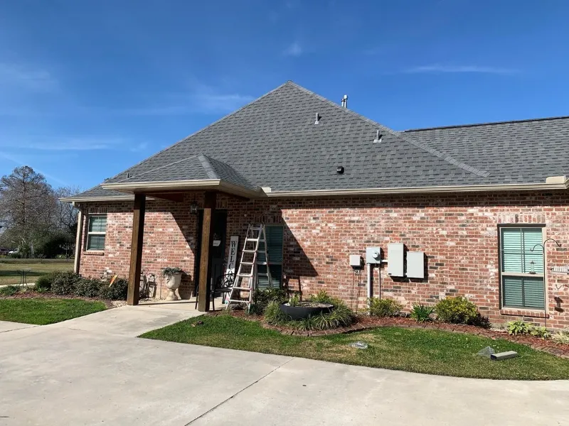 angled view of side entrance with covered porch an