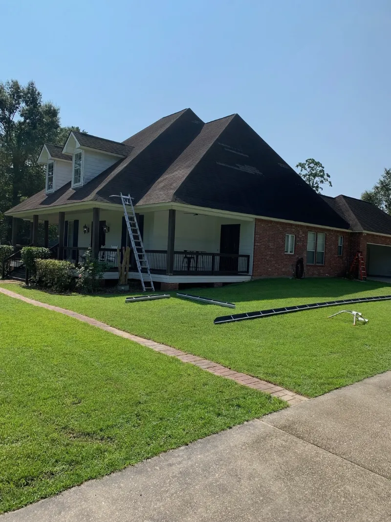 apartment building ladders gutter work gonzales performance patios and gutters