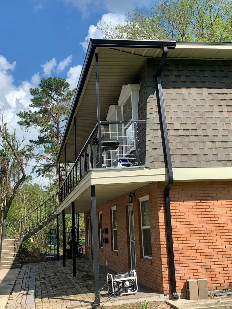 baton rouge two story balcony gutter install performance patios and gutters