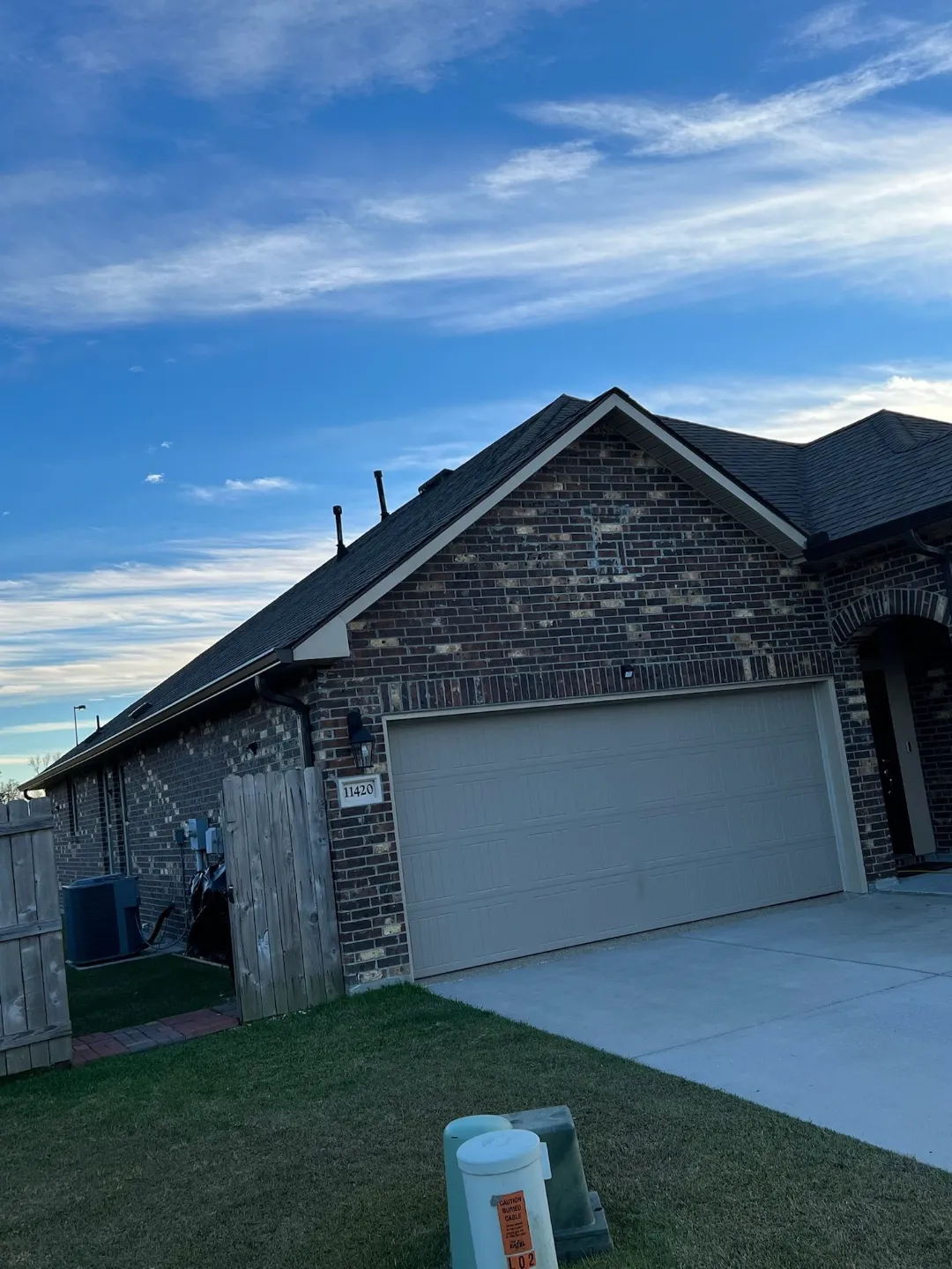 black gutters dark brick house denham springs
