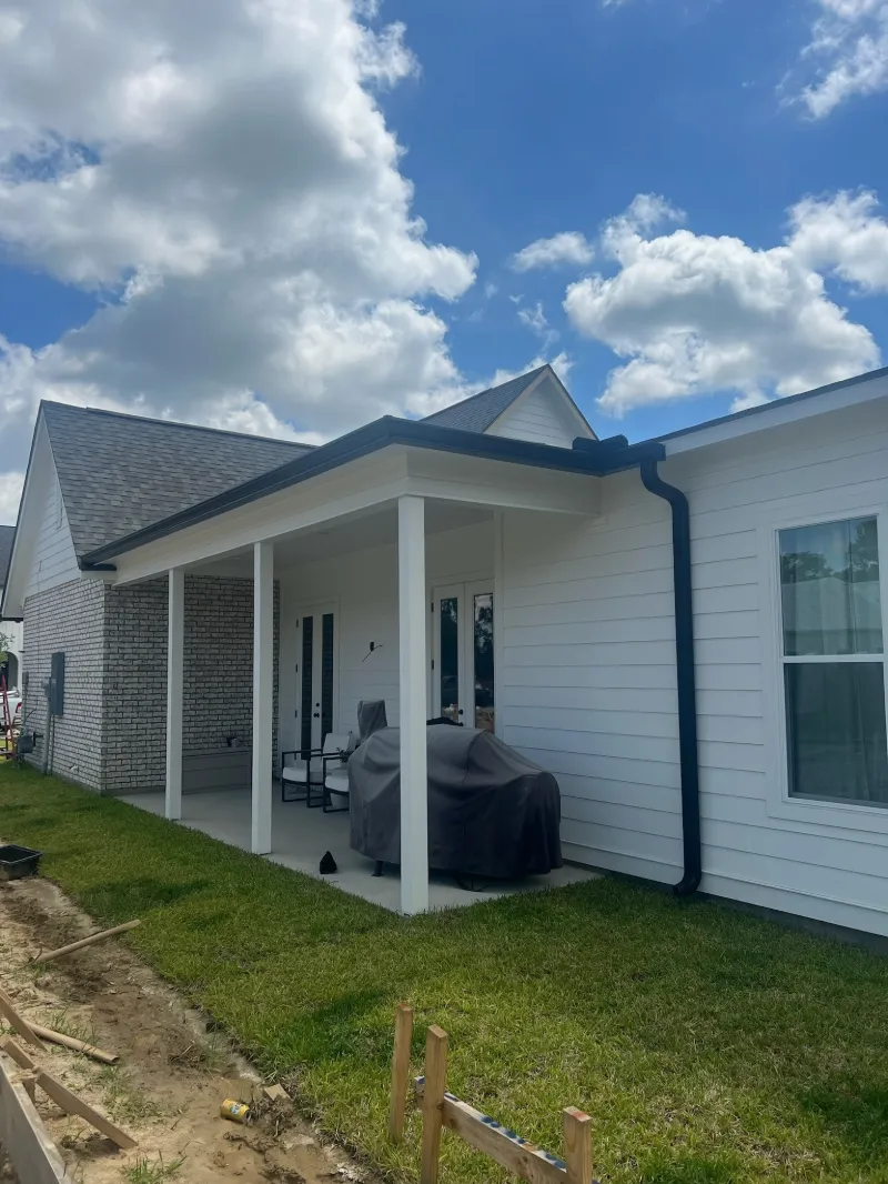 black gutters white house covered patio performance patios la