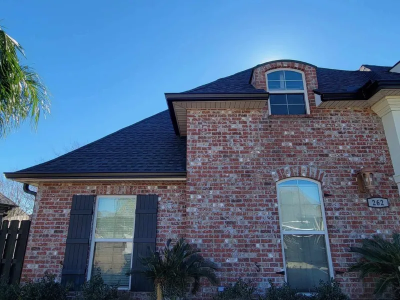 brick home with roofline and gutters in baton rouge