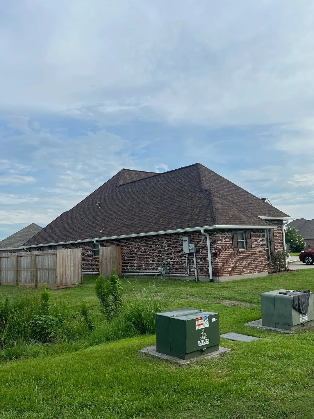 brown gutters brick house backyard prairieville la