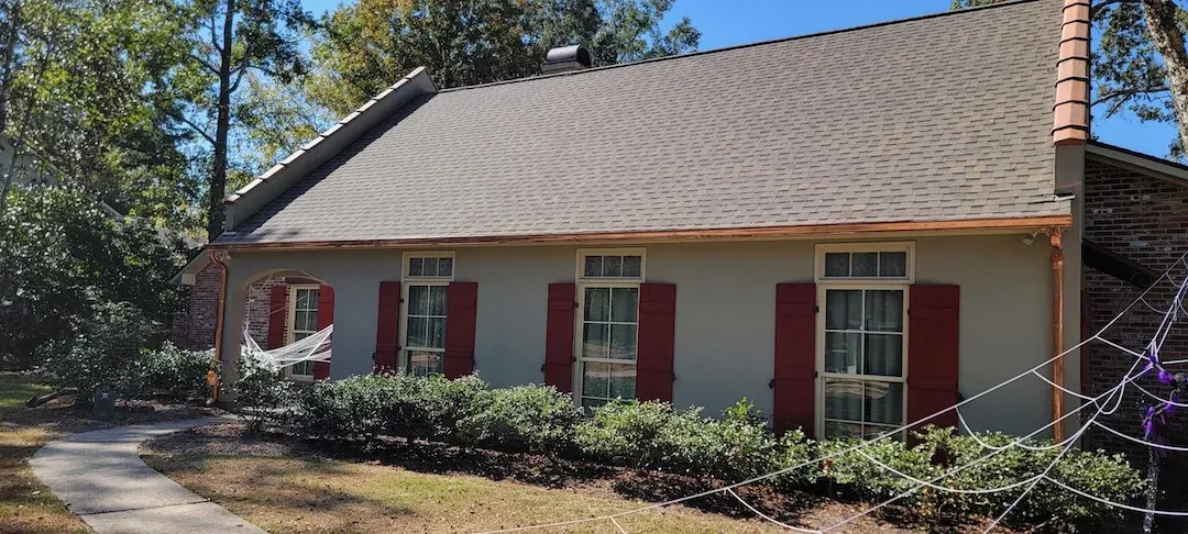 copper gutters light stucco house halloween baker 1