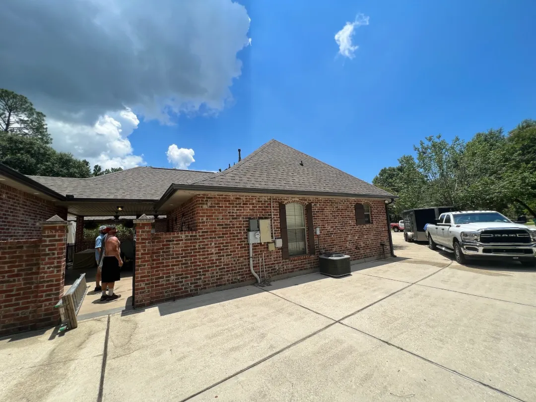 dark brown gutters brick house driveway denham springs la