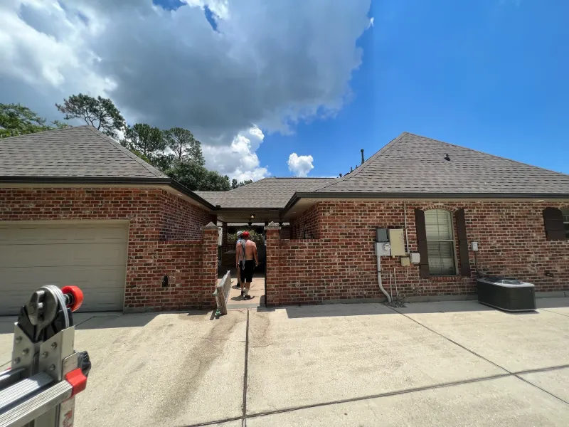 dark brown gutters brick house opelousas la