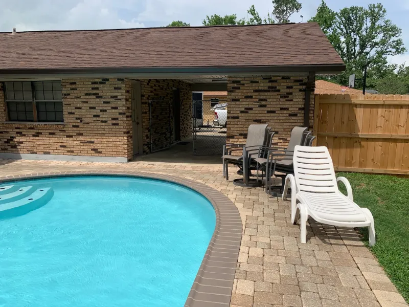 dark brown gutters brick pool house performance patios la