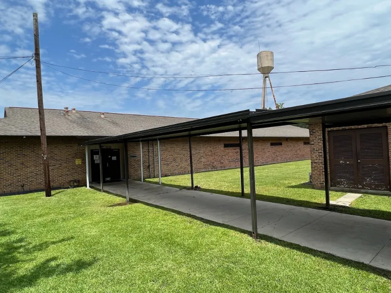 dark covered walkway integrated gutters plaquemine la