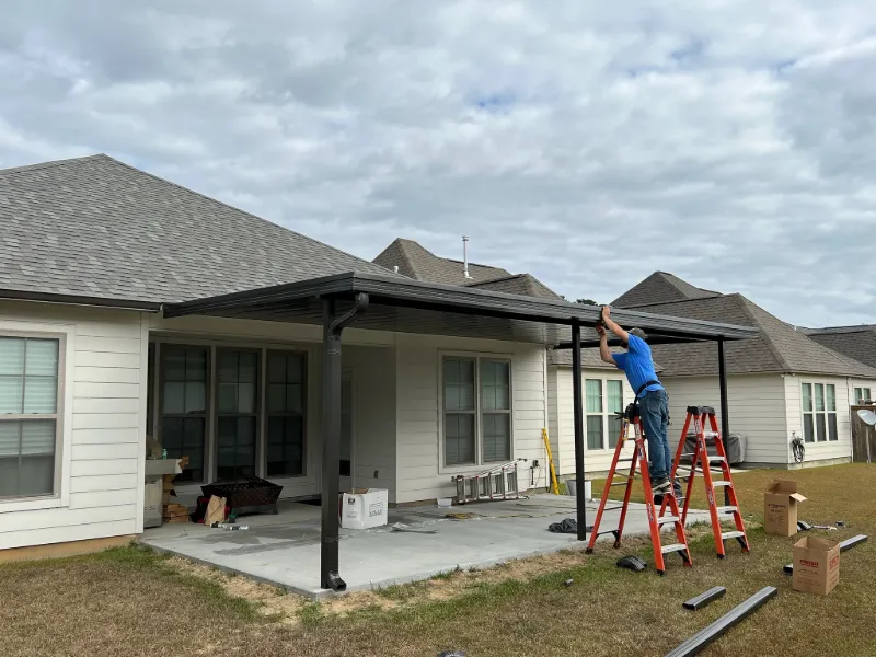 dark gutters above white garage door yukon