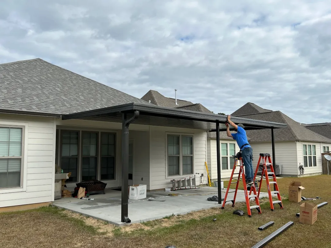 dark gutters above white garage door yukon
