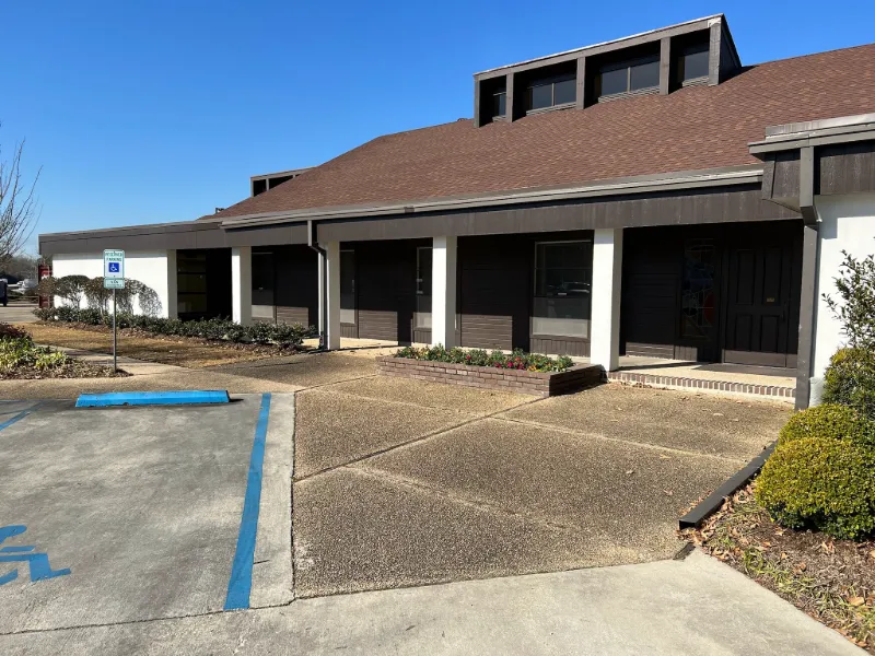 dark gutters commercial building handicap parking baton rouge area