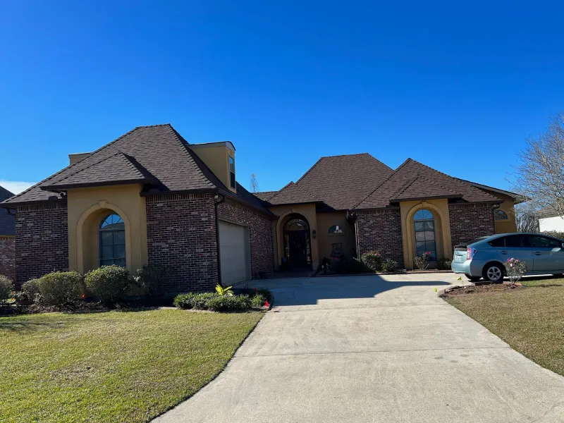 dark gutters on brick stucco house denham springs