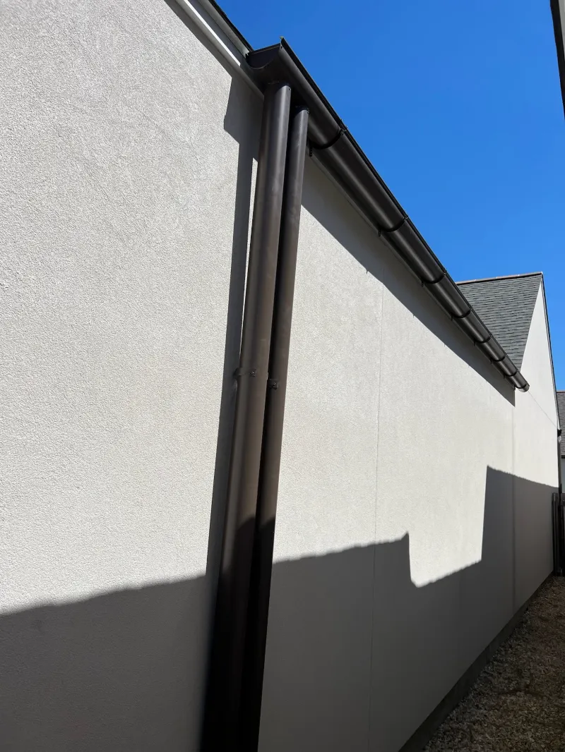 dark gutters stucco wall prairieville la