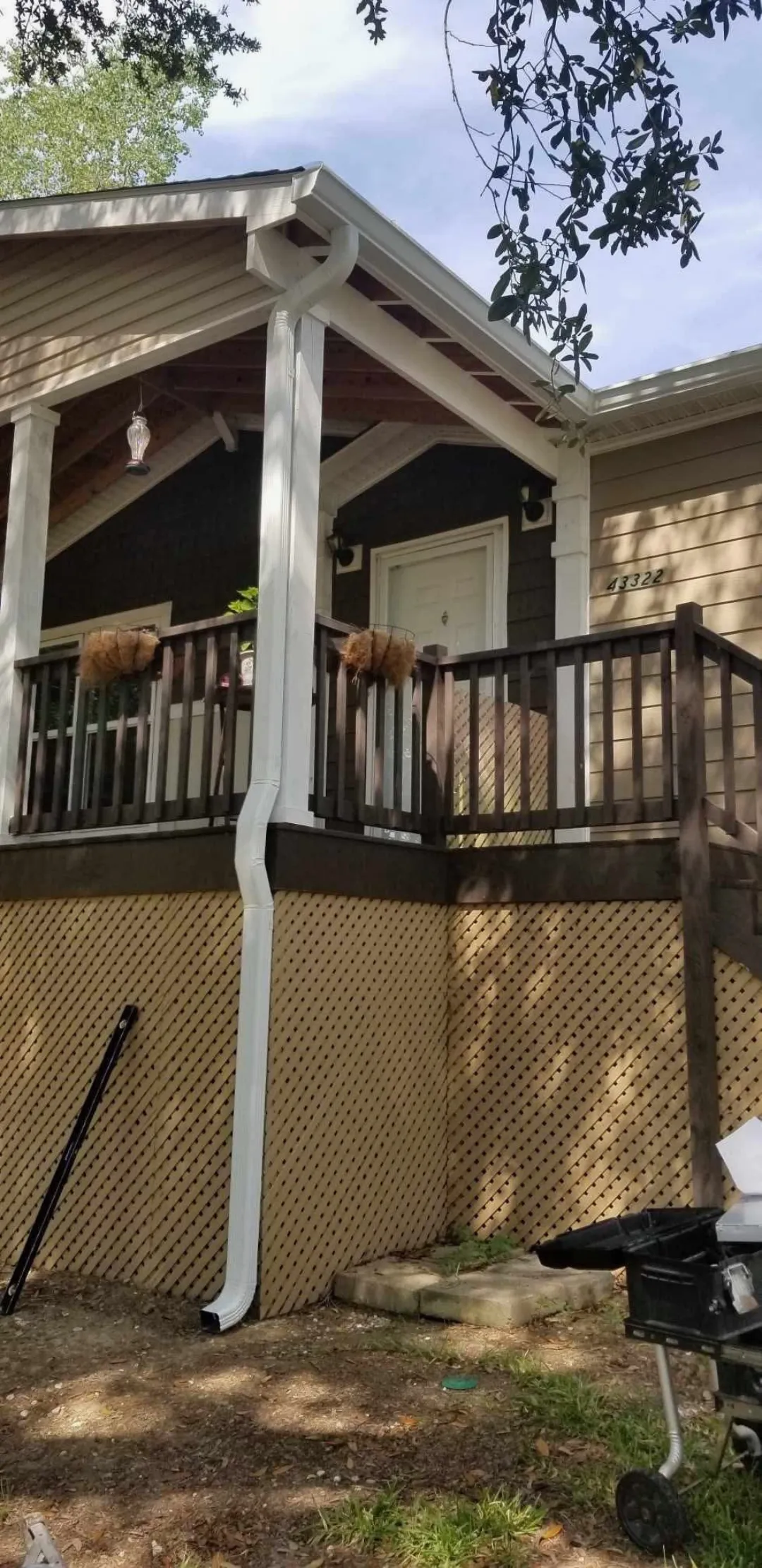 gutter installation with black trim in baton rouge