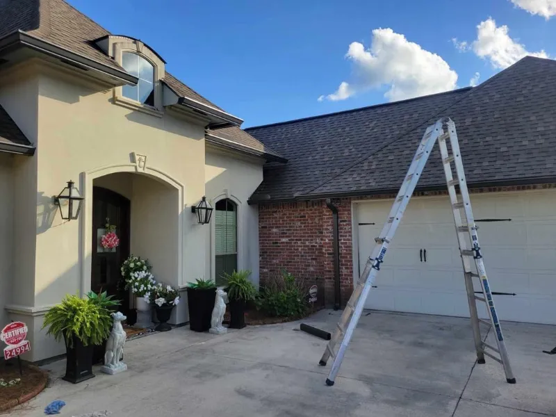 ladder for gutter installation on home in baton rouge