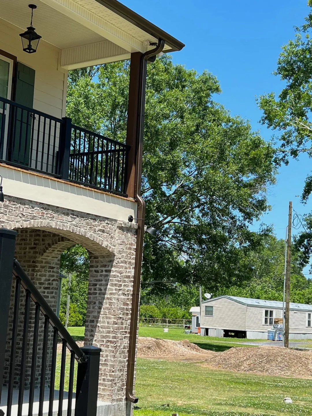 light colored house dark gutters mobile home denham springs la