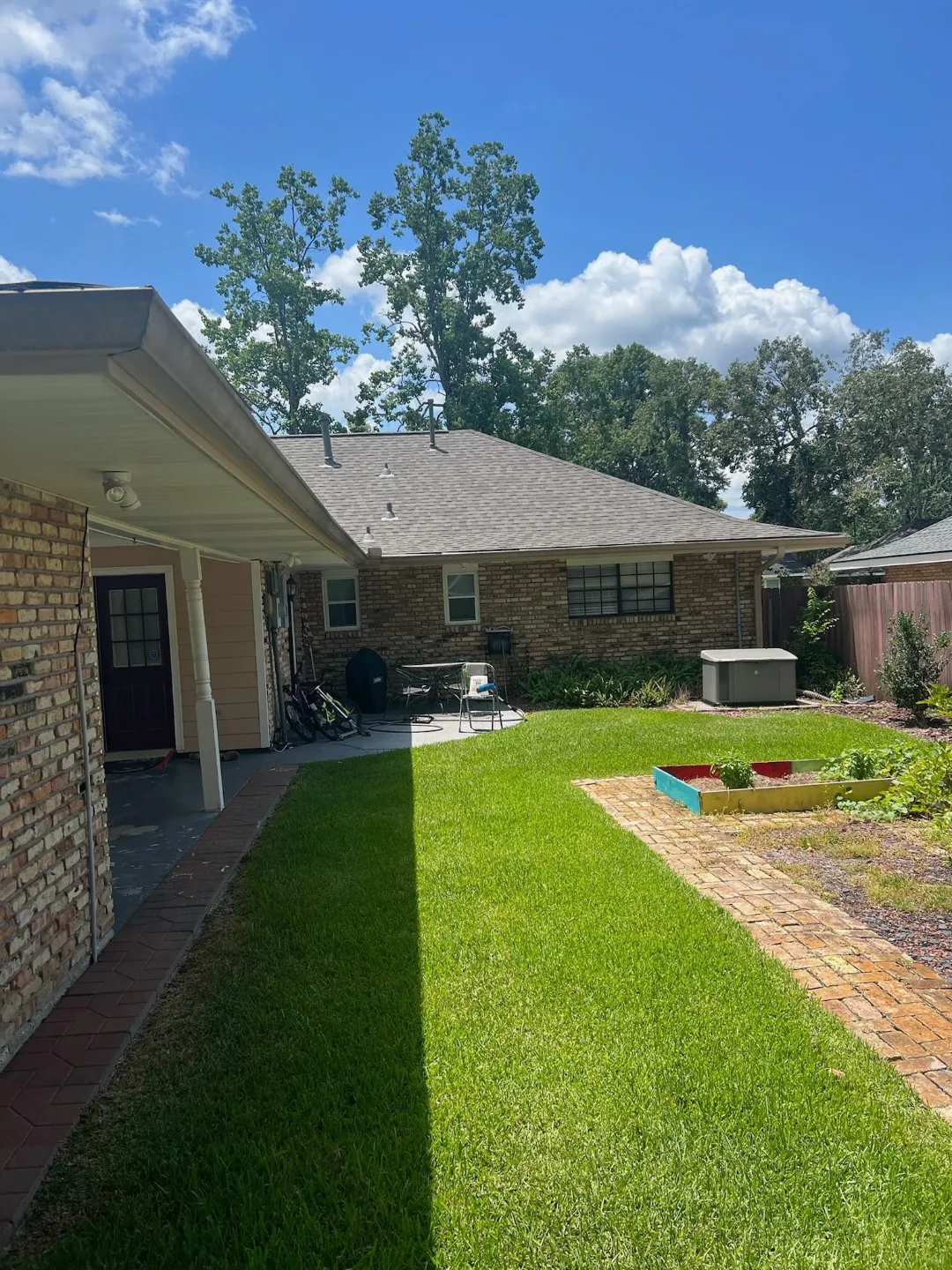 light gutters brick house backyard central la