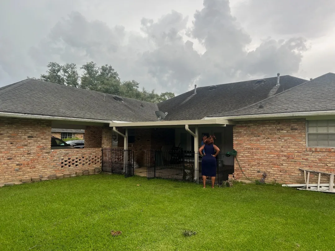 light gutters covered patio brick house backyard lake charles la