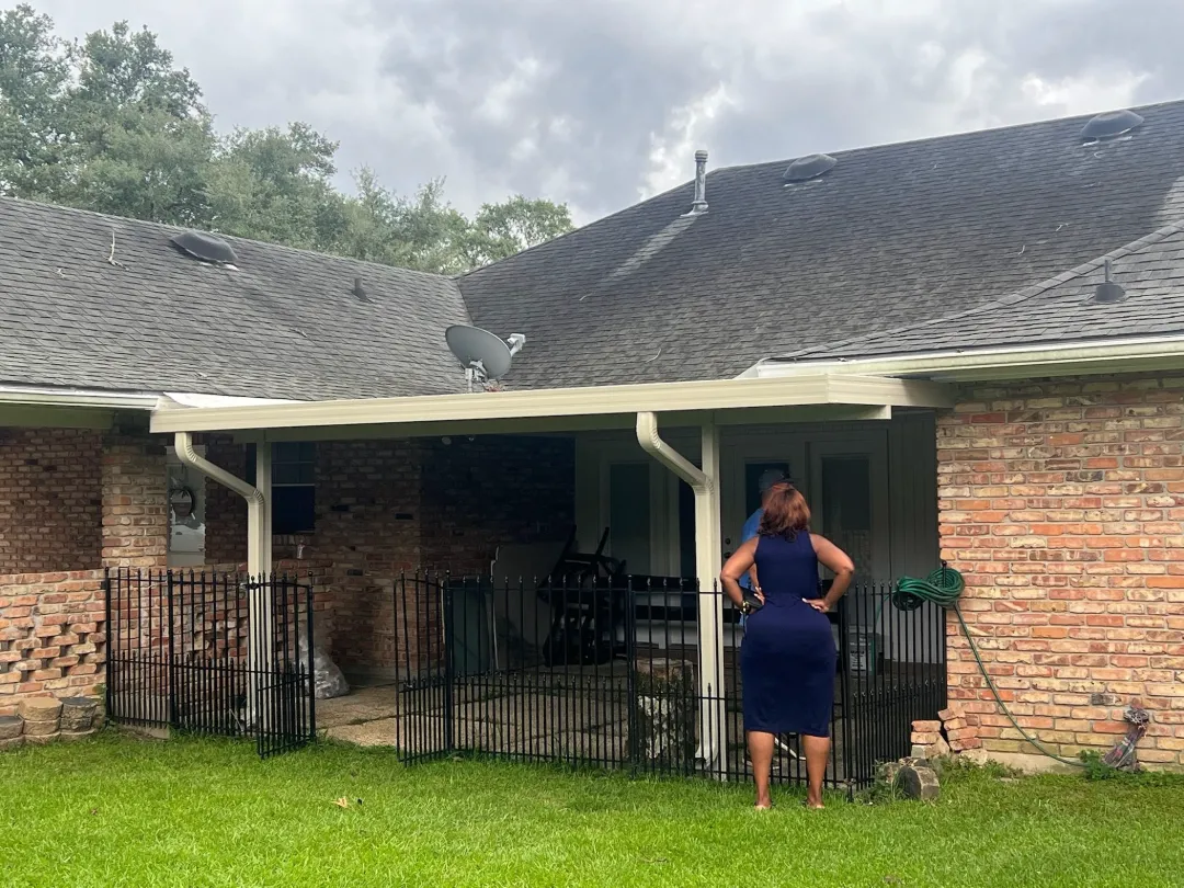 light gutters covered patio brick house lake charles la