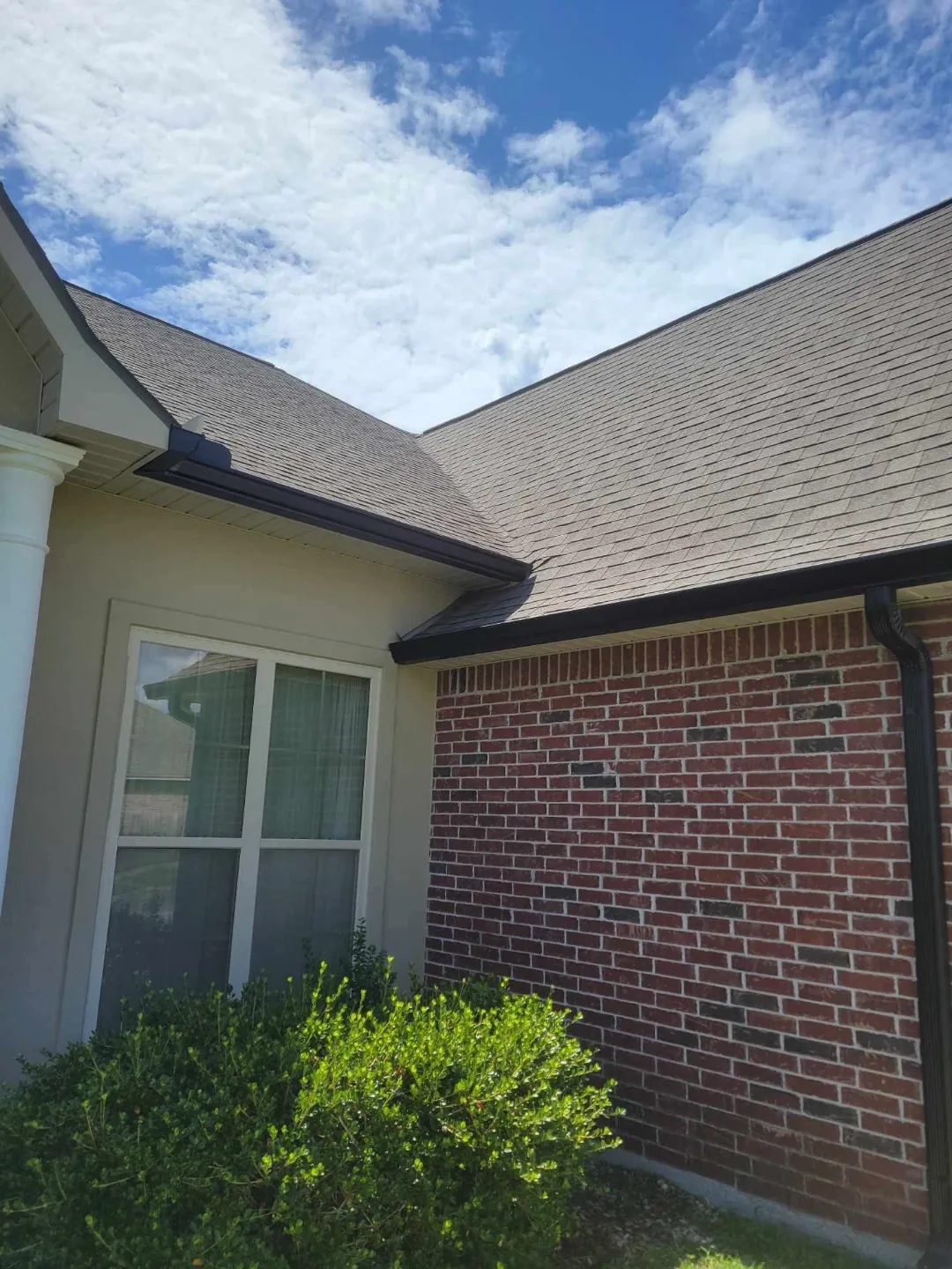 patio cover on red brick home in baton rouge