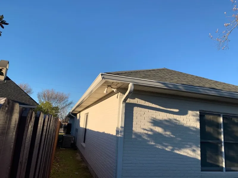 red brick home rear window gutter detail