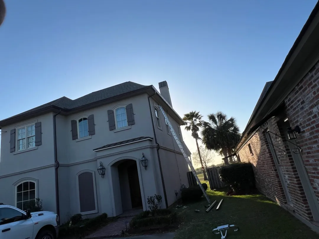 two story stucco house ladder gonzales la