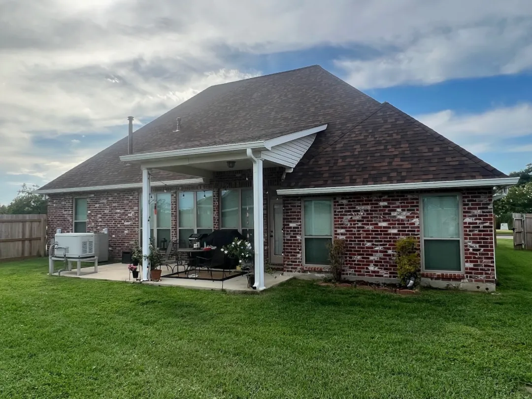 white gutters brick house back patio lafayette la