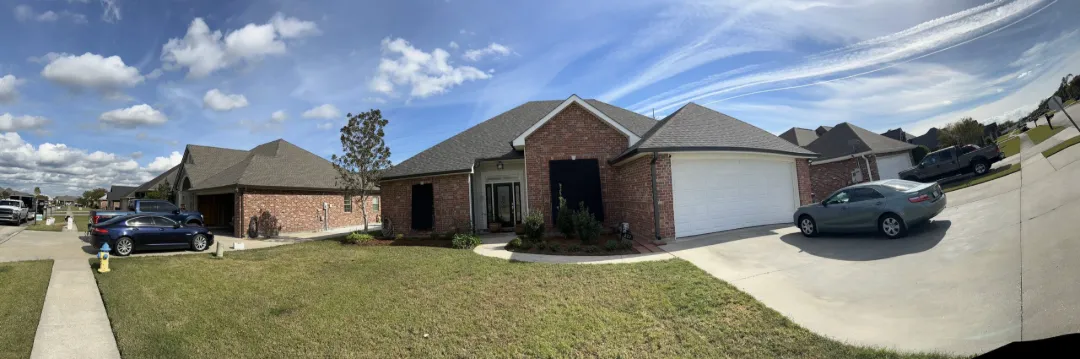white gutters on red brick house yukon scaled