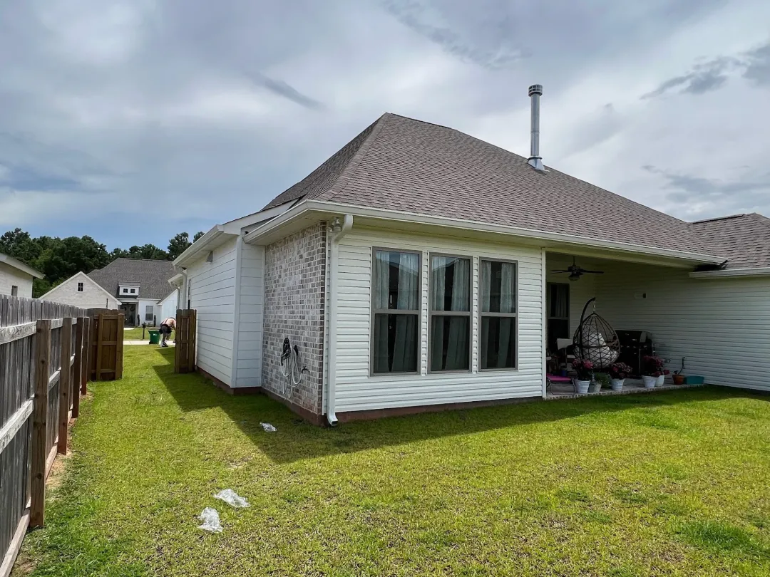 white gutters siding brick house covered patio hammond la
