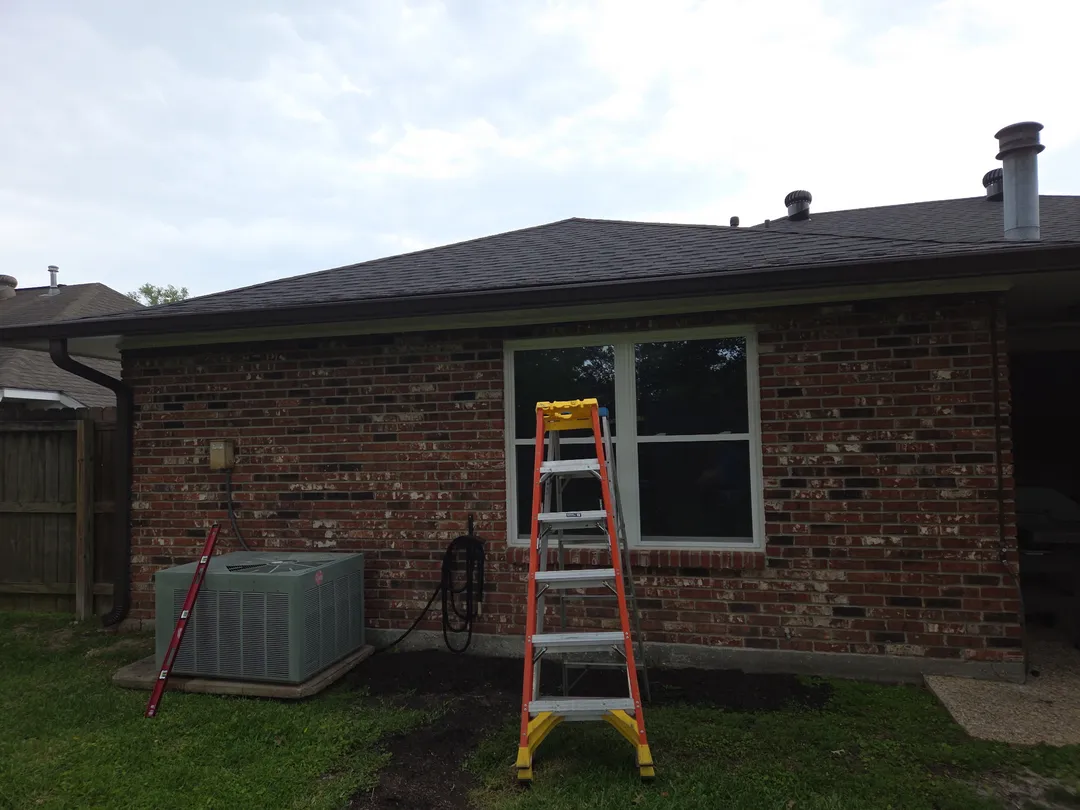 brick home backyard gutter install ladder performance patios and gutters