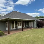 covered patio green home seamless gutters performance patios and gutters