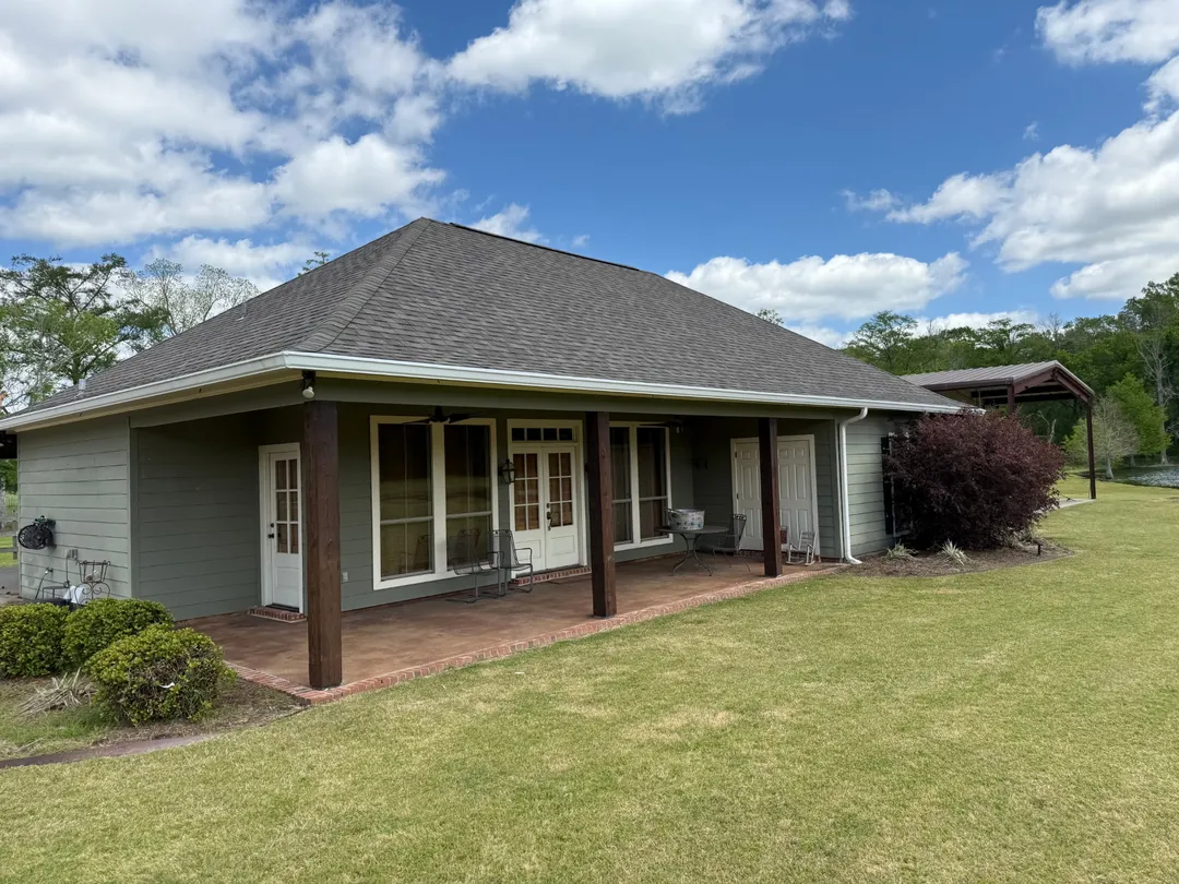 covered patio green home seamless gutters performance patios and gutters