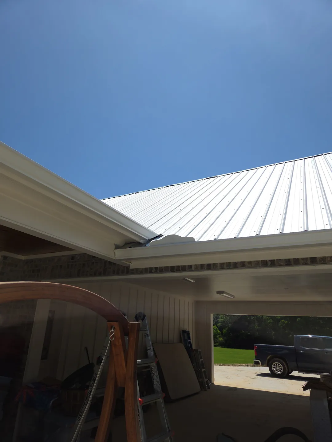 white metal roof garage gutter installation performance patios and gutters